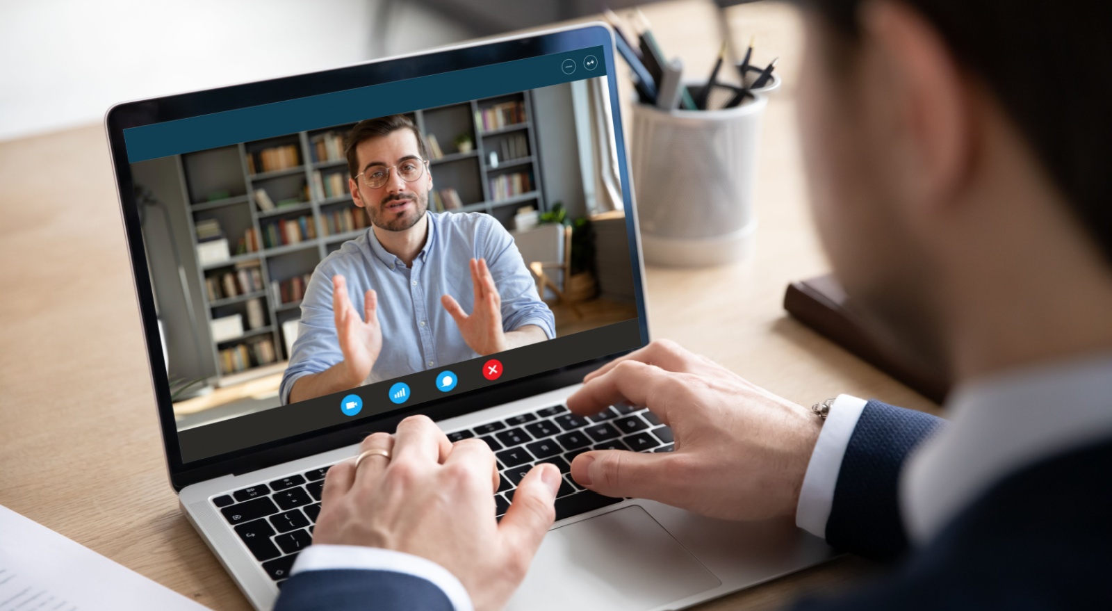 Someone using Zoom to talk to a person.