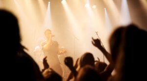 A band on stage at a gig.