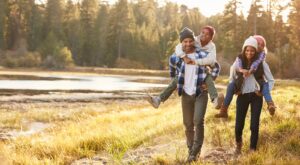 A family hiking in the woods.