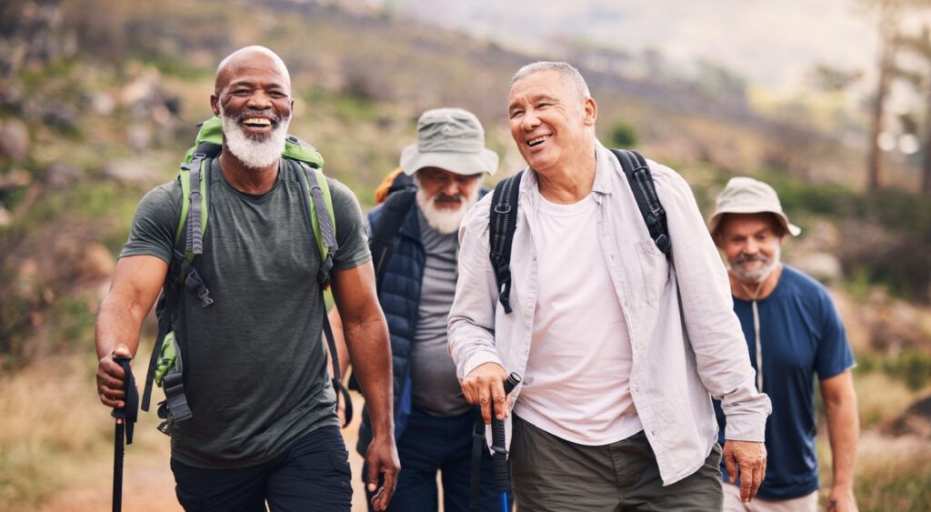 A group of men hiking together.
