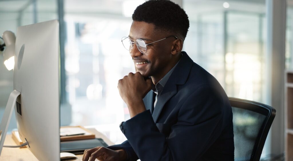 A man working at a computer.