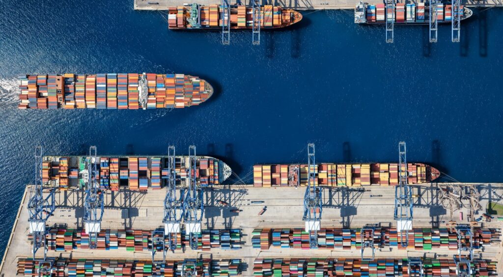 An aerial view of a cargo ship harbour.