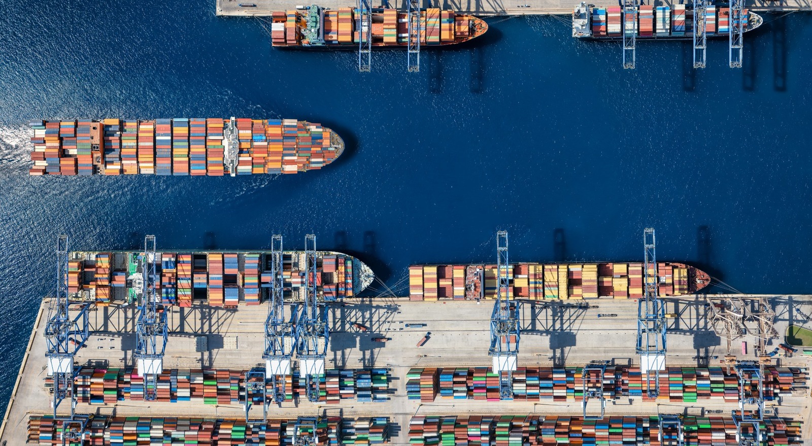 An aerial view of a cargo ship harbour.