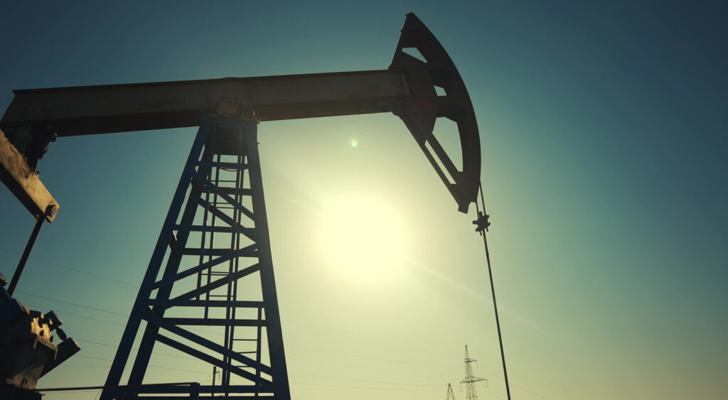 A silhouette of an oil pump.