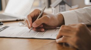 A man checking paperwork.