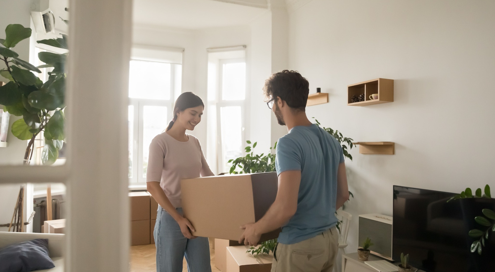 A couple moving into their first home.